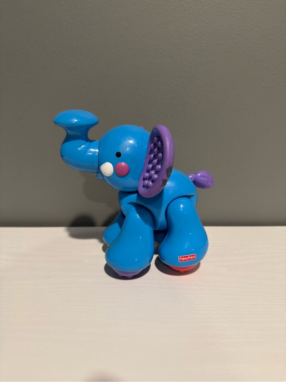 Fisher-Price Blue Elephant sensory Pull Toy with Purple Ears